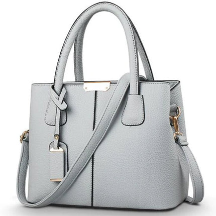 Bolsa feminina em couro PU